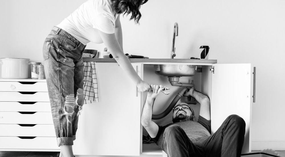 plumber under sink